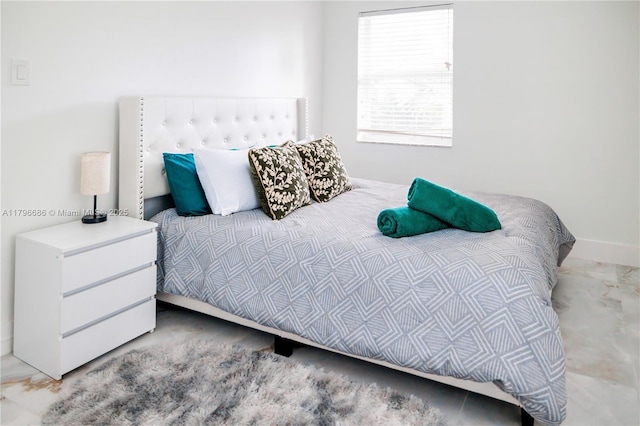 1649 NE 8th Ave, Fort Lauderdale, FL 33305 - bedroom with marble look tiles and baseboards