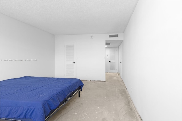 2030 S Ocean Dr Unit 1708, Hallandale Beach, FL 33009 - bedroom featuring concrete floors and a textured ceiling