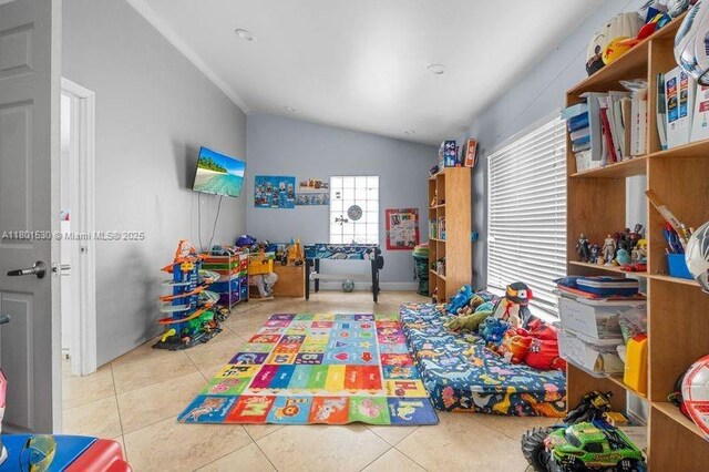 550 Auburn Way, Davie, FL 33325 - game room with lofted ceiling and tile patterned floors