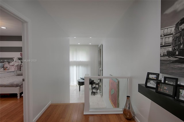 1530 NE Quayside Ter Unit A1, Miami, FL 33138 - corridor with wood finished floors, recessed lighting, an upstairs landing, and baseboards