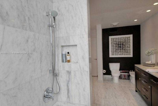 1530 NE Quayside Ter Unit A1, Miami, FL 33138 - bathroom featuring a shower, vanity, toilet, and recessed lighting
