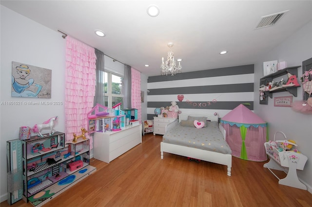 1530 NE Quayside Ter Unit A1, Miami, FL 33138 - bedroom with a chandelier, recessed lighting, and wood finished floors