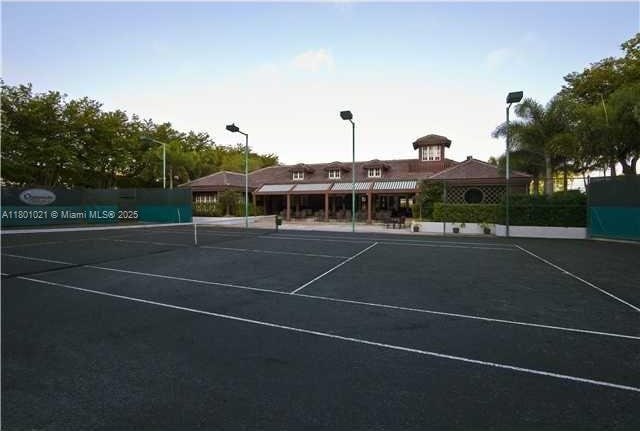 1530 NE Quayside Ter Unit A1, Miami, FL 33138 - view of tennis court with fence