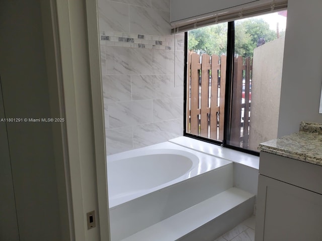 637 Executive Center Dr Unit N102, West Palm Beach, FL 33401 - full bath with a garden tub and vanity