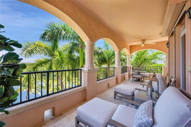 view of patio / terrace featuring a ceiling fan, a balcony, and outdoor lounge area