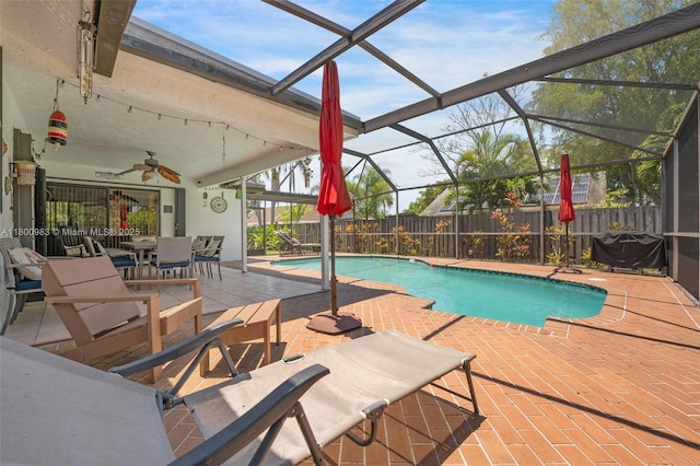 735 SW 158th Ter, Sunrise, FL 33326 - view of swimming pool with a fenced backyard, a patio area, a ceiling fan, and outdoor dining area