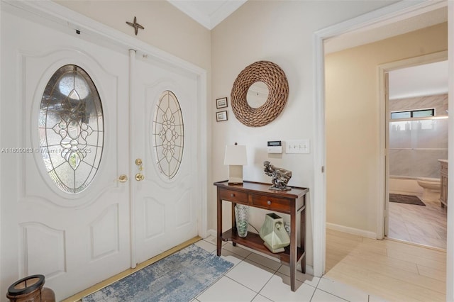 735 SW 158th Ter, Sunrise, FL 33326 - entrance foyer featuring light tile patterned floors and baseboards