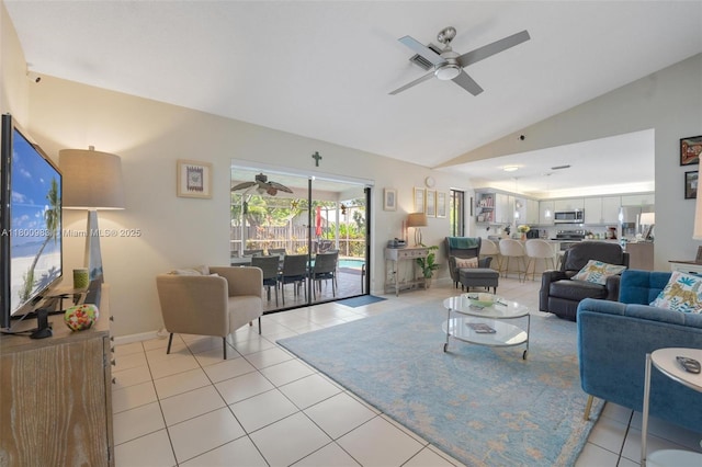 735 SW 158th Ter, Sunrise, FL 33326 - living room featuring a ceiling fan, lofted ceiling, and light tile patterned floors