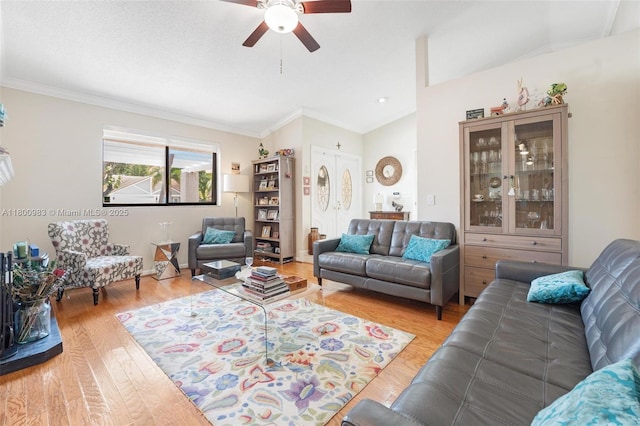 735 SW 158th Ter, Sunrise, FL 33326 - living room featuring ceiling fan, lofted ceiling, ornamental molding, and light wood-type flooring