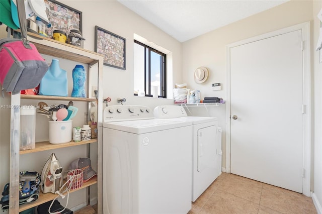 735 SW 158th Ter, Sunrise, FL 33326 - laundry room featuring washer and dryer and light tile patterned floors