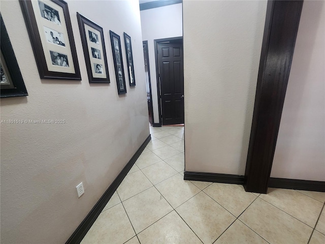 8216 SW 166th Pl, Miami, FL 33193 - hallway featuring baseboards and light tile patterned flooring