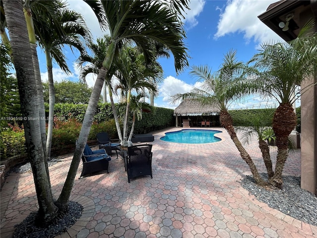 8216 SW 166th Pl, Miami, FL 33193 - view of swimming pool with a patio and an outdoor structure