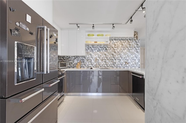 2030 S Ocean Dr Unit 1707, Hallandale Beach, FL 33009 - kitchen with stainless steel refrigerator with ice dispenser, track lighting, dishwasher, tasteful backsplash, and modern cabinets