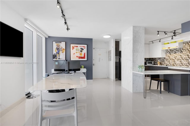 2030 S Ocean Dr Unit 1707, Hallandale Beach, FL 33009 - dining area featuring track lighting and light tile patterned flooring