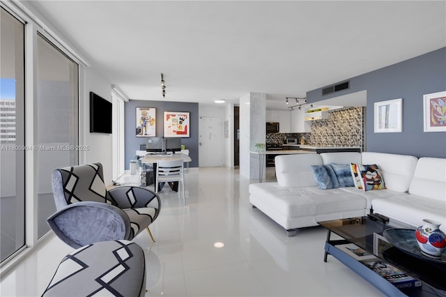 2030 S Ocean Dr Unit 1707, Hallandale Beach, FL 33009 - living room featuring rail lighting and light tile patterned floors