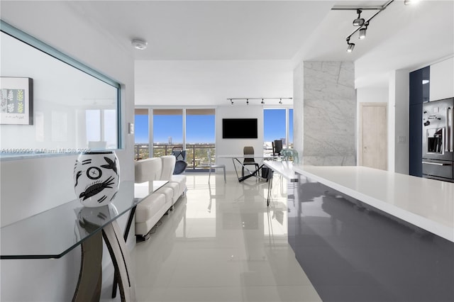 2030 S Ocean Dr Unit 1707, Hallandale Beach, FL 33009 - hall featuring rail lighting and tile patterned floors