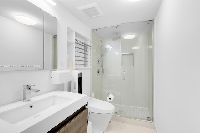 2030 S Ocean Dr Unit 1707, Hallandale Beach, FL 33009 - full bath featuring a shower stall, toilet, vanity, and tile patterned floors
