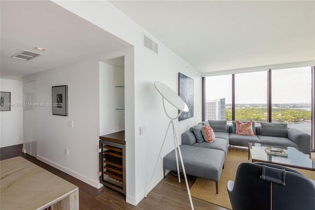 3131 NE 7th Ave Unit 3606, Miami, FL 33137 - living room with wine cooler, wood finished floors, baseboards, and expansive windows