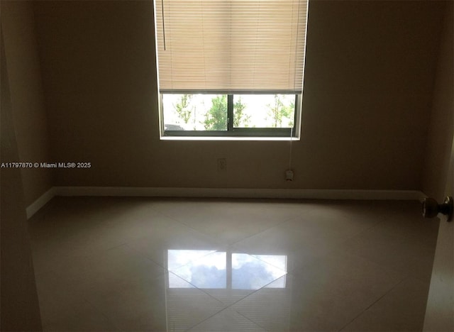 3664 Alder Dr Unit B1, West Palm Beach, FL 33417 - unfurnished room featuring baseboards
