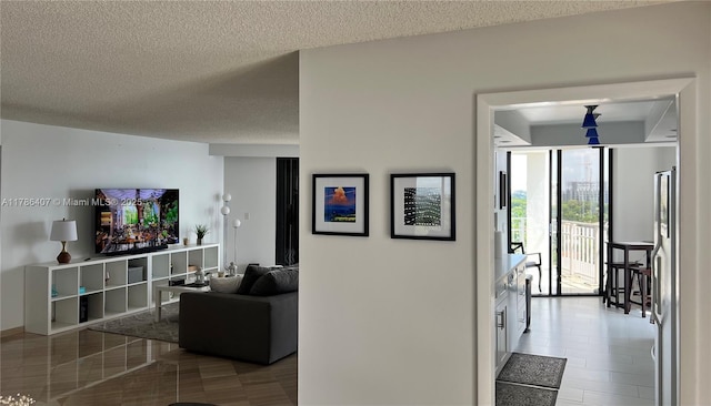 4000 NE Towwerside Ter Unit 1101, Miami, FL 33138 - corridor featuring a textured ceiling