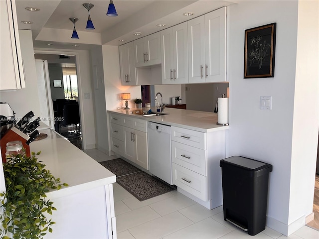 4000 NE Towwerside Ter Unit 1101, Miami, FL 33138 - kitchen with white dishwasher, light countertops, a sink, white cabinetry, and recessed lighting