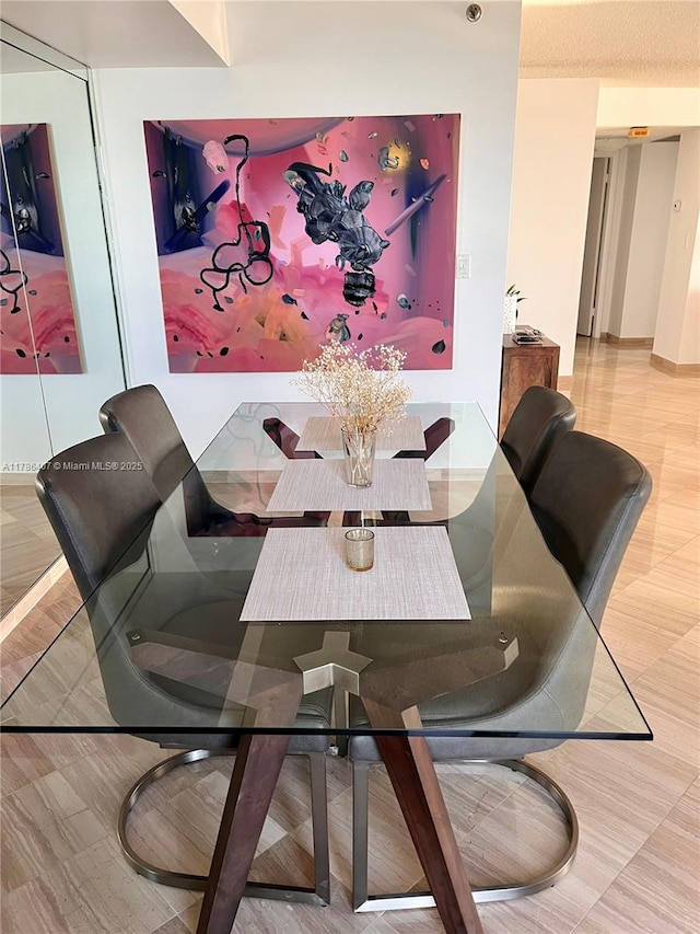 4000 NE Towwerside Ter Unit 1101, Miami, FL 33138 - dining area featuring baseboards