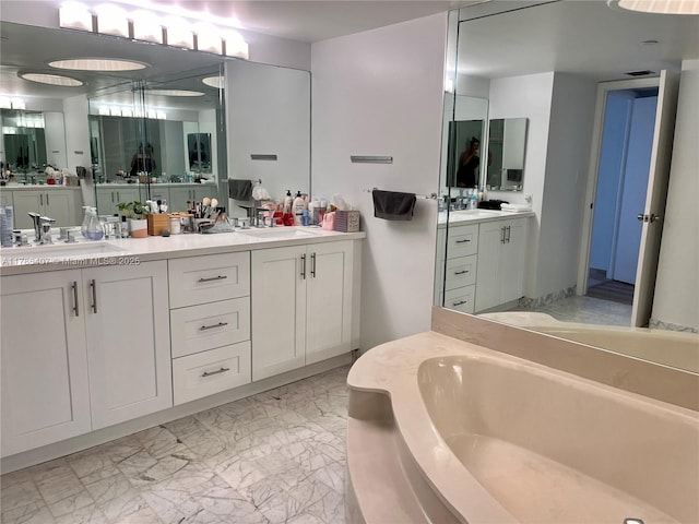 4000 NE Towwerside Ter Unit 1101, Miami, FL 33138 - full bathroom featuring double vanity, a bath, and marble finish flooring