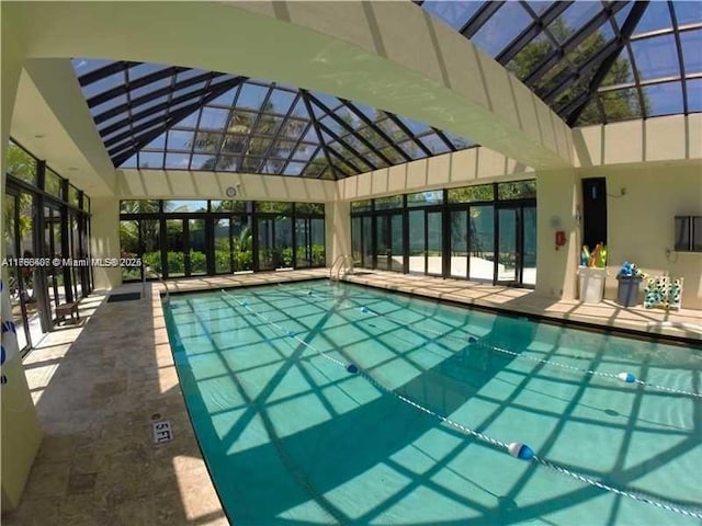 4000 NE Towwerside Ter Unit 1101, Miami, FL 33138 - indoor community pool featuring glass enclosure and a patio area
