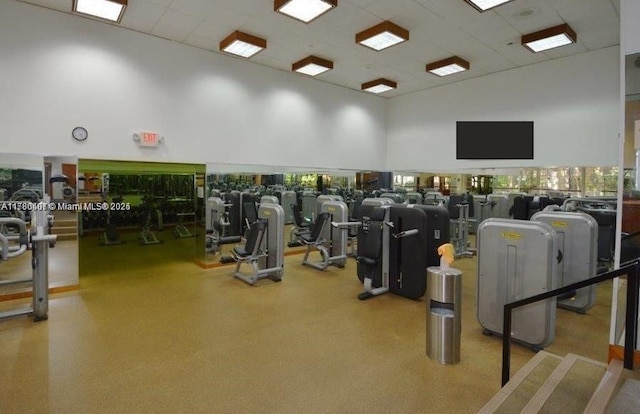 4000 NE Towwerside Ter Unit 1101, Miami, FL 33138 - exercise room with a towering ceiling and a drop ceiling