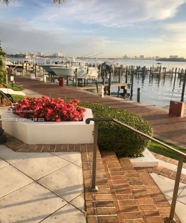 4000 NE Towwerside Ter Unit 1101, Miami, FL 33138 - dock area featuring a water view and boat lift