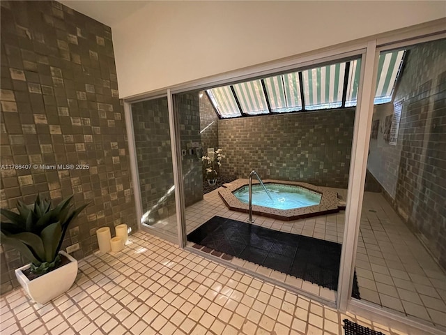 4000 NE Towwerside Ter Unit 1101, Miami, FL 33138 - bathroom with tile patterned floors and tile walls