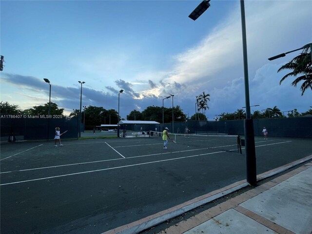 4000 NE Towwerside Ter Unit 1101, Miami, FL 33138 - view of tennis court featuring fence