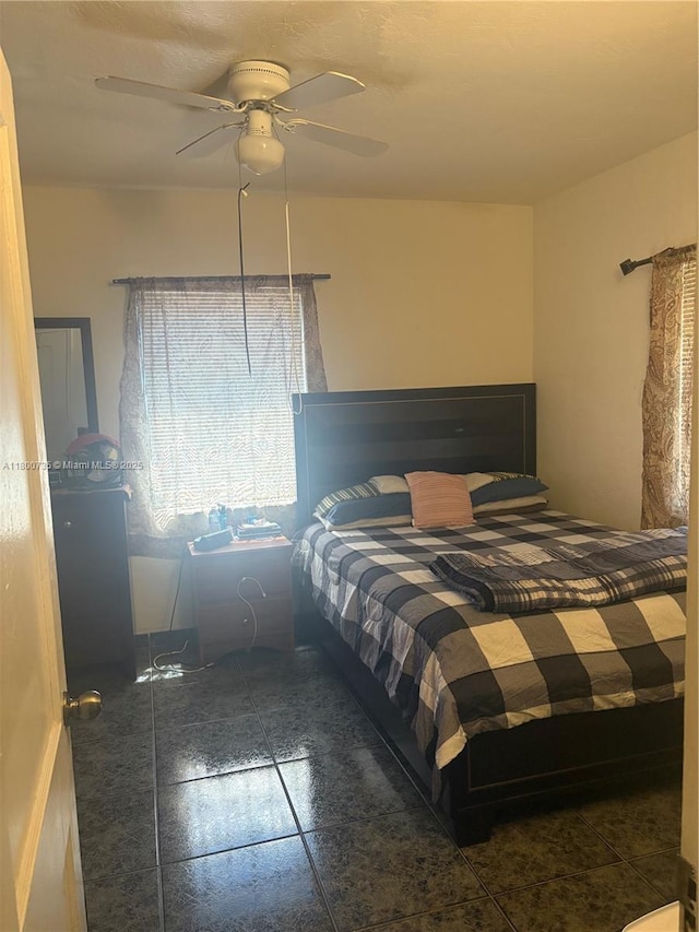 2530 Washington St, Hollywood, FL 33020 - tiled bedroom with ceiling fan
