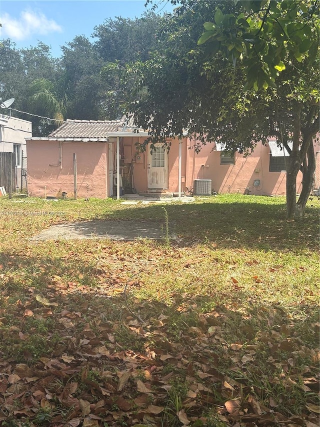 2530 Washington St, Hollywood, FL 33020 - view of grassy yard with cooling unit