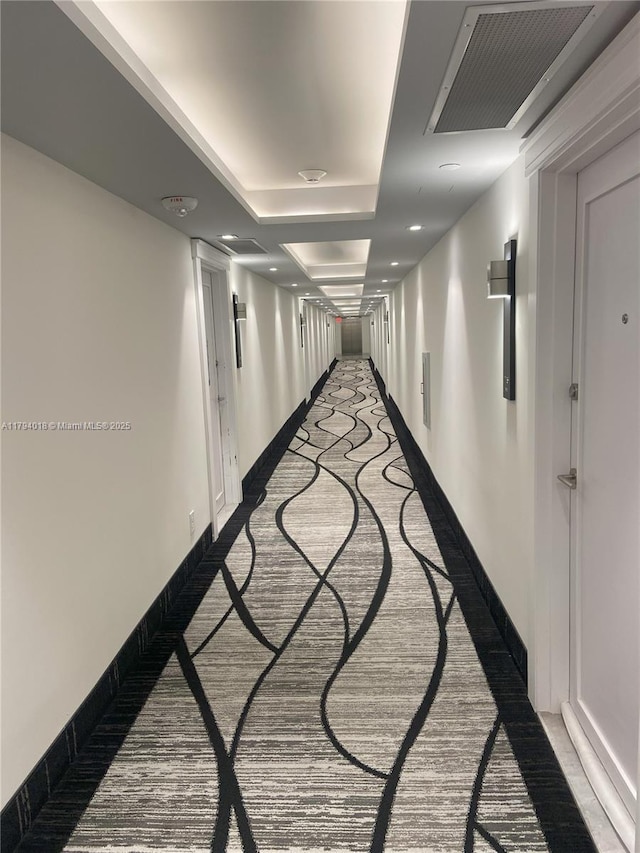 3180 S Ocean Dr Unit 716, Hallandale Beach, FL 33009 - hallway featuring light colored carpet and baseboards