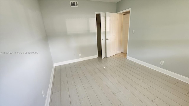 981 Hillcrest Ct Unit 114, Hollywood, FL 33021 - spare room with baseboards and wood finished floors