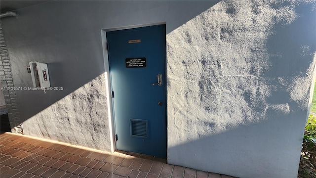 981 Hillcrest Ct Unit 114, Hollywood, FL 33021 - doorway to property featuring stucco siding