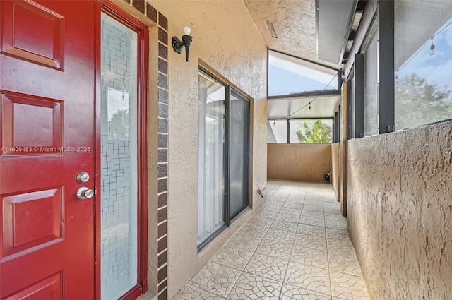 2323 NW 37th Ave, Coconut Creek, FL 33066 - doorway to property featuring stucco siding