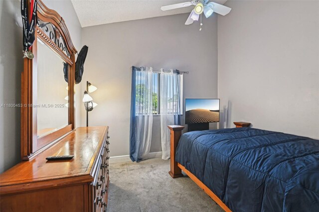 2323 NW 37th Ave, Coconut Creek, FL 33066 - bedroom featuring light carpet, high vaulted ceiling, and a ceiling fan