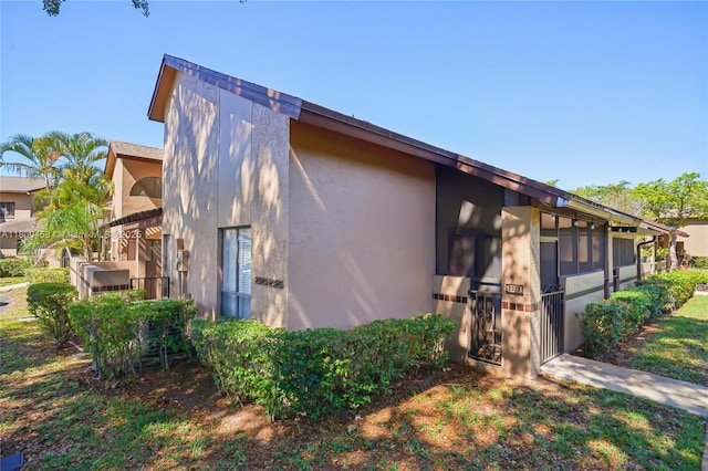 2323 NW 37th Ave, Coconut Creek, FL 33066 - view of property exterior with stucco siding