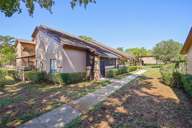 2323 NW 37th Ave, Coconut Creek, FL 33066 - view of side of property featuring stucco siding