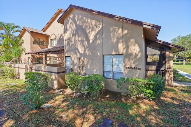 2323 NW 37th Ave, Coconut Creek, FL 33066 - view of side of property with stucco siding