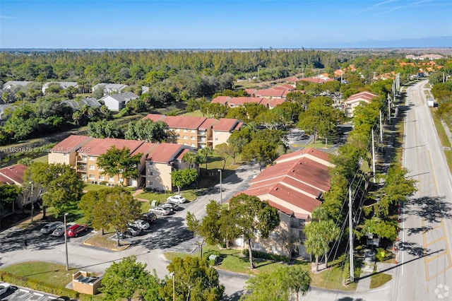 1141 Lake Victoria Dr Unit E, West Palm Beach, FL 33411 - aerial view of residential area featuring a forest