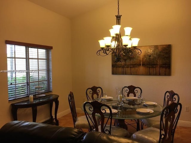 13135 SW 218th Ter, Miami, FL 33170 - tiled dining area featuring baseboards and a chandelier