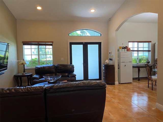 13135 SW 218th Ter, Miami, FL 33170 - living area featuring arched walkways, light tile patterned flooring, plenty of natural light, recessed lighting, and baseboards
