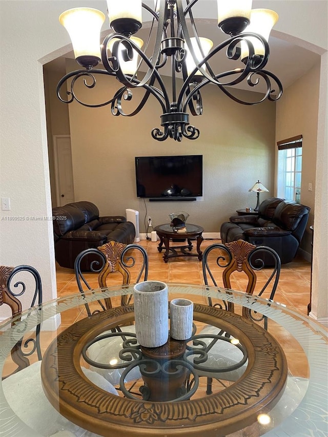 13135 SW 218th Ter, Miami, FL 33170 - dining space with inlaid floor details, a chandelier, and baseboards