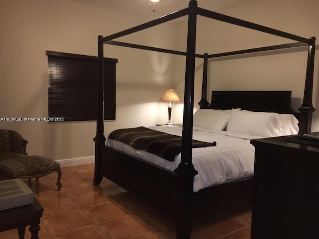 13135 SW 218th Ter, Miami, FL 33170 - bedroom featuring tile patterned flooring and baseboards