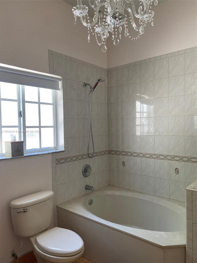 13135 SW 218th Ter, Miami, FL 33170 - full bathroom with a chandelier, toilet, and  shower combination