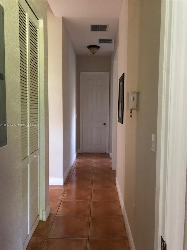13135 SW 218th Ter, Miami, FL 33170 - corridor with tile patterned flooring and baseboards