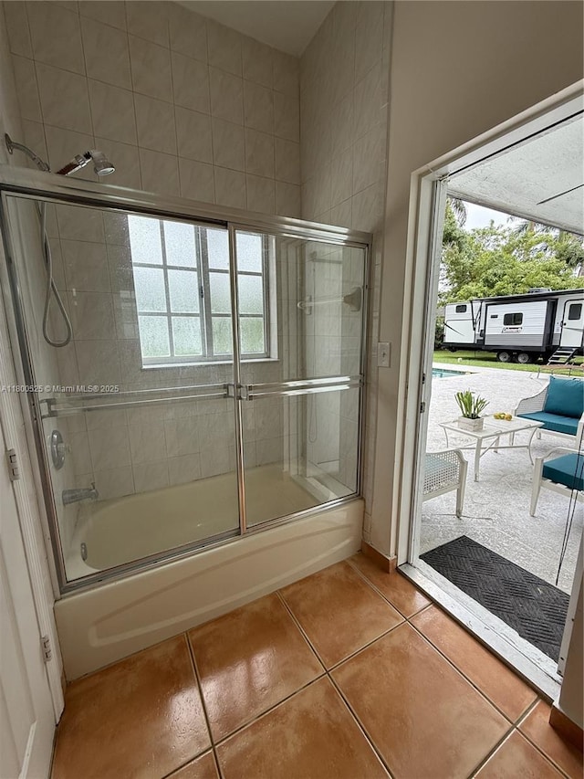 13135 SW 218th Ter, Miami, FL 33170 - full bathroom with tile patterned flooring, shower / bath combination with glass door, and healthy amount of natural light